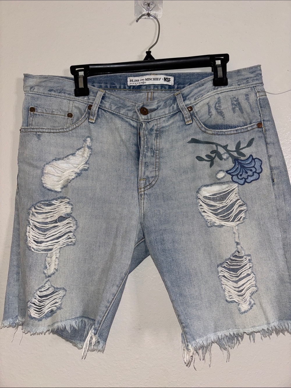 Bliss and Mischief Light Blue Distressed Denim Shorts